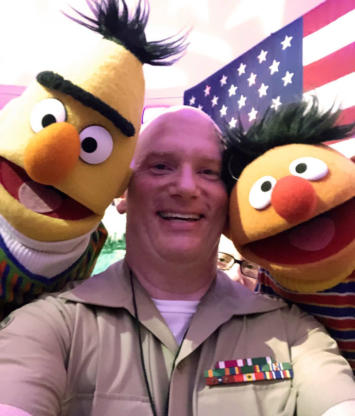 Peter celebrates with Bert & Ernie from Sesame Street